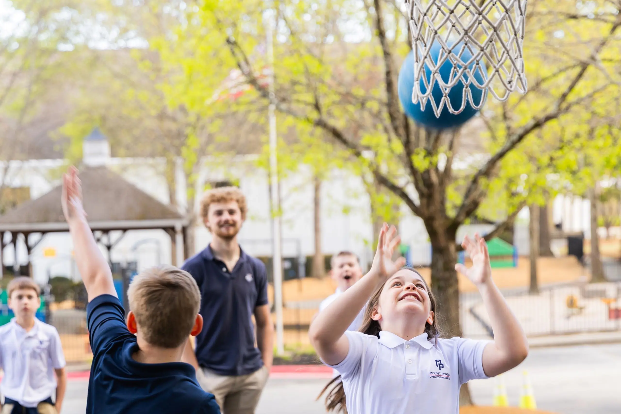 Students playing basketball