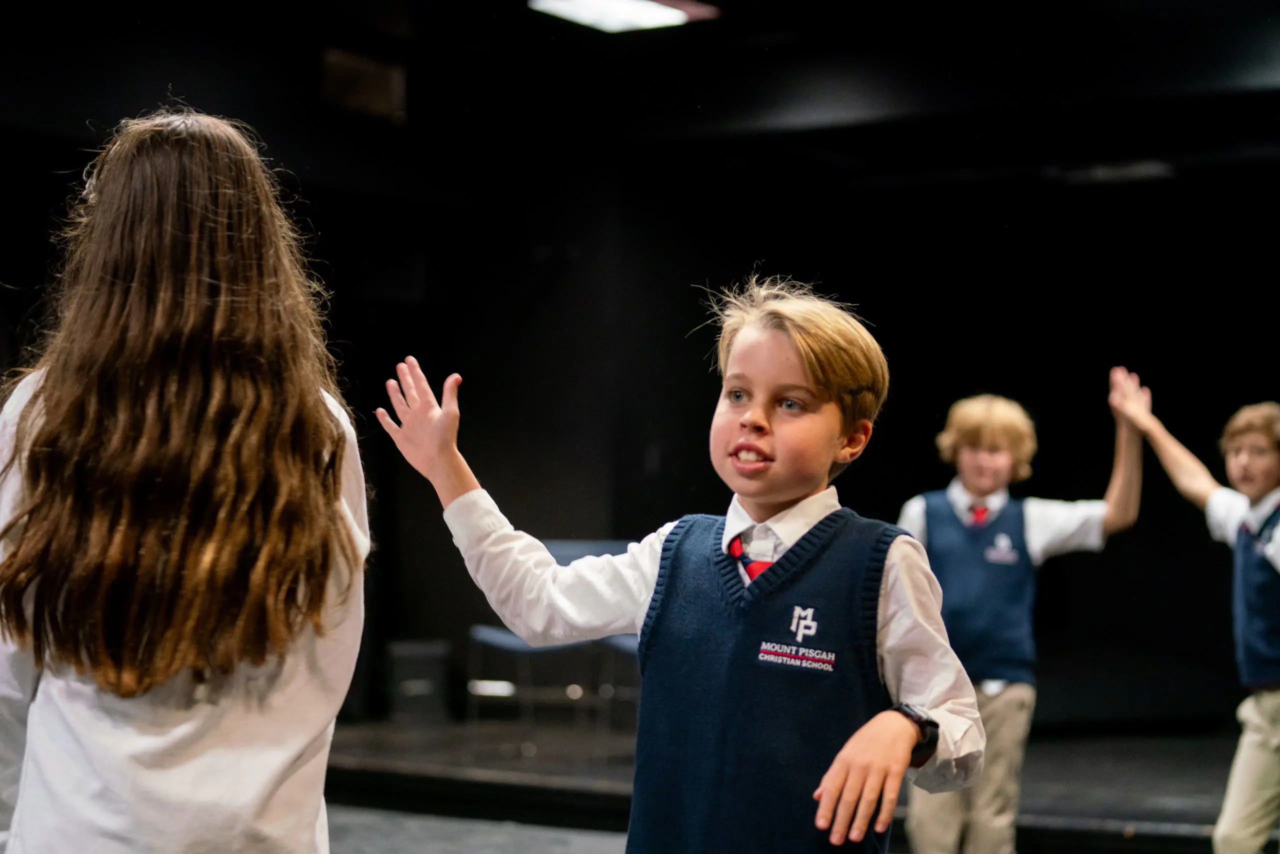 Students rehearsing for a performance