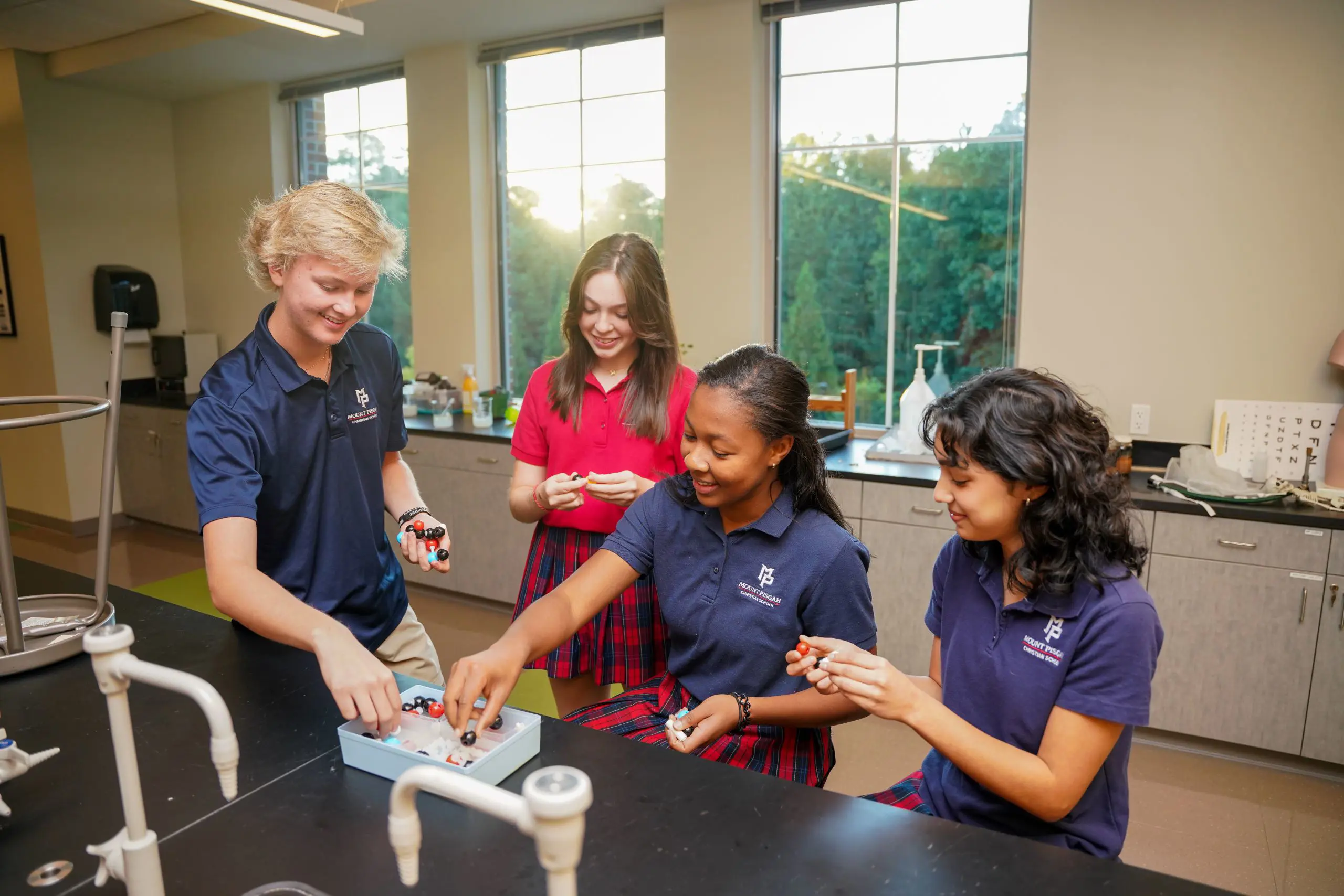 Four students in a lab